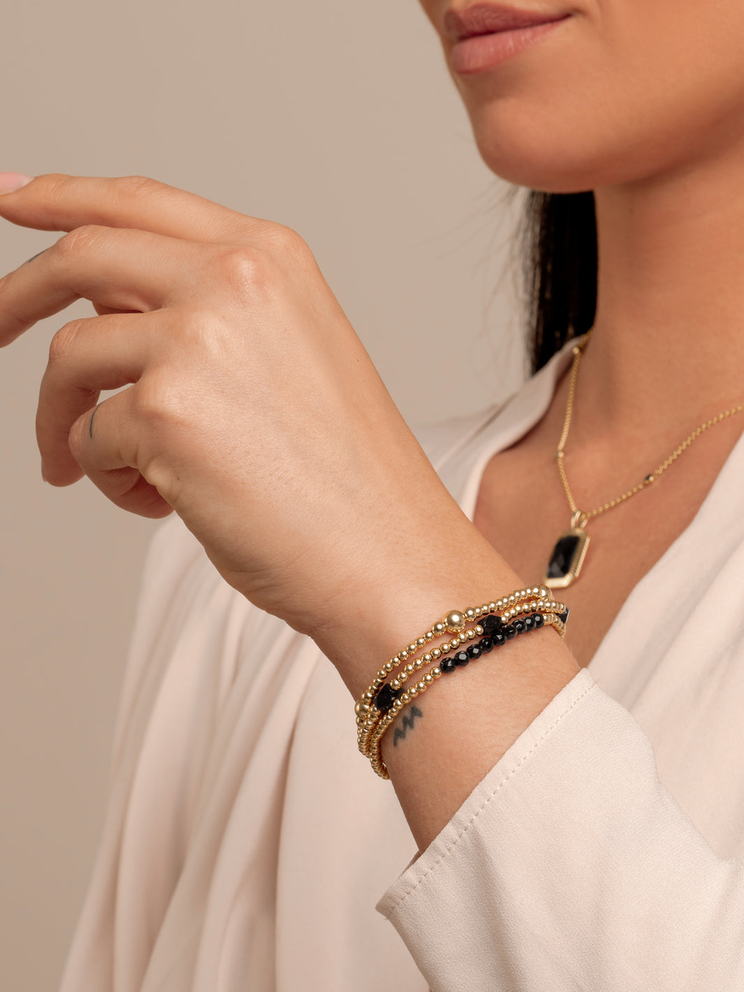 Onyx Reverse Edge Mix armbaden stack | Goudkleurig