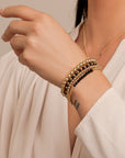 Onyx Saturn Mix Armbanden Stack | Goudkleurig