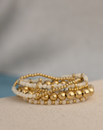 Opalite Roundel Bicolor Armbanden Stack | Goudkleurig